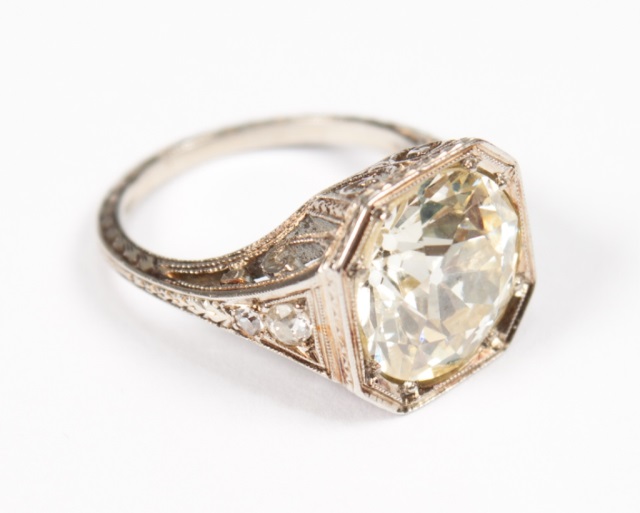 Appraisal: Round-cut diamond solitaire ring approx cts centering a round mine-cut