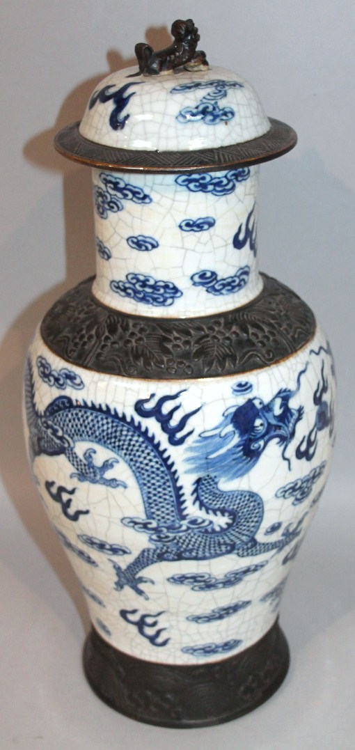 Appraisal: A Ming style Chinese pottery vase the domed lid with