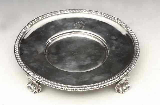 Appraisal: A GEORGE III SILVER DISH circular with gadrooned border and