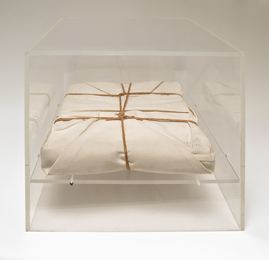 Appraisal: CHRISTO Wrapped Book Bound volume wrapped in canvas and twine