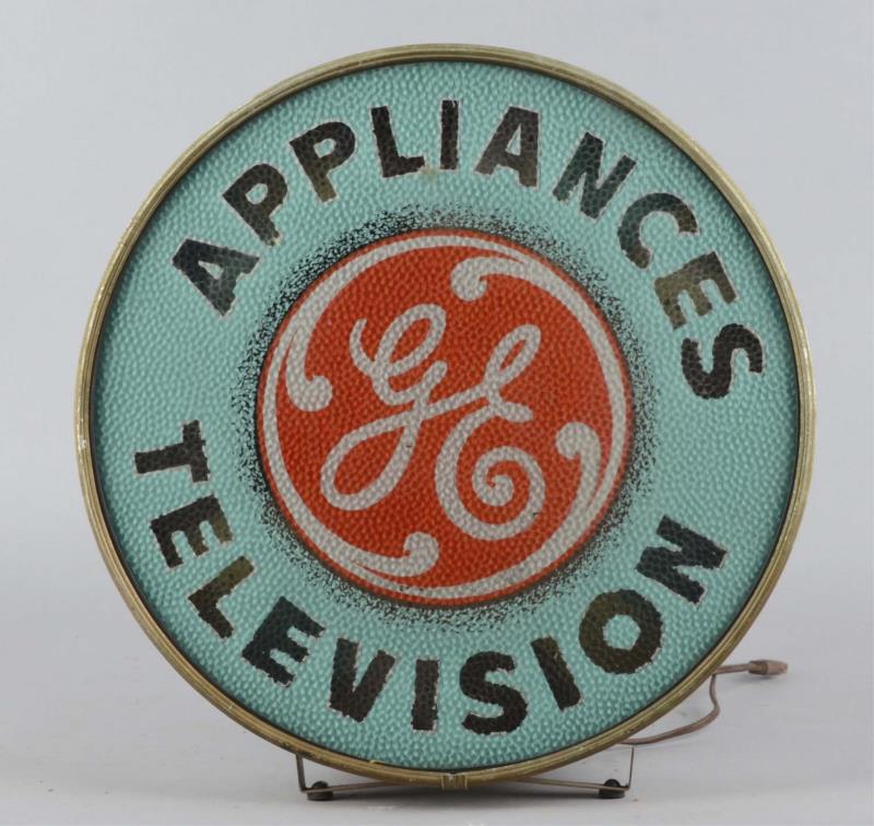 Appraisal: General Electric Round Lighted Advertising Sign This textured reverse on