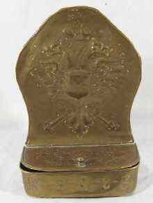 Appraisal: A brass candle box probably Russian the back embossed with