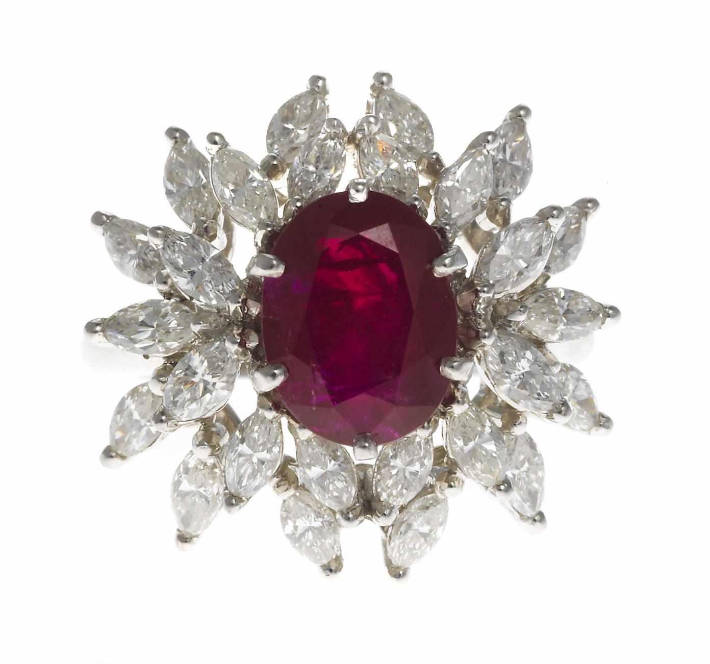 Appraisal: A ruby and diamond ring oval-shaped ruby weighing approximately carats