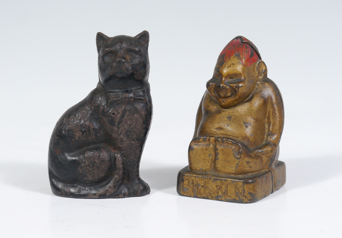 Appraisal: CAT AND BILLIKEN STILL CAST IRON BANKS pieces total to