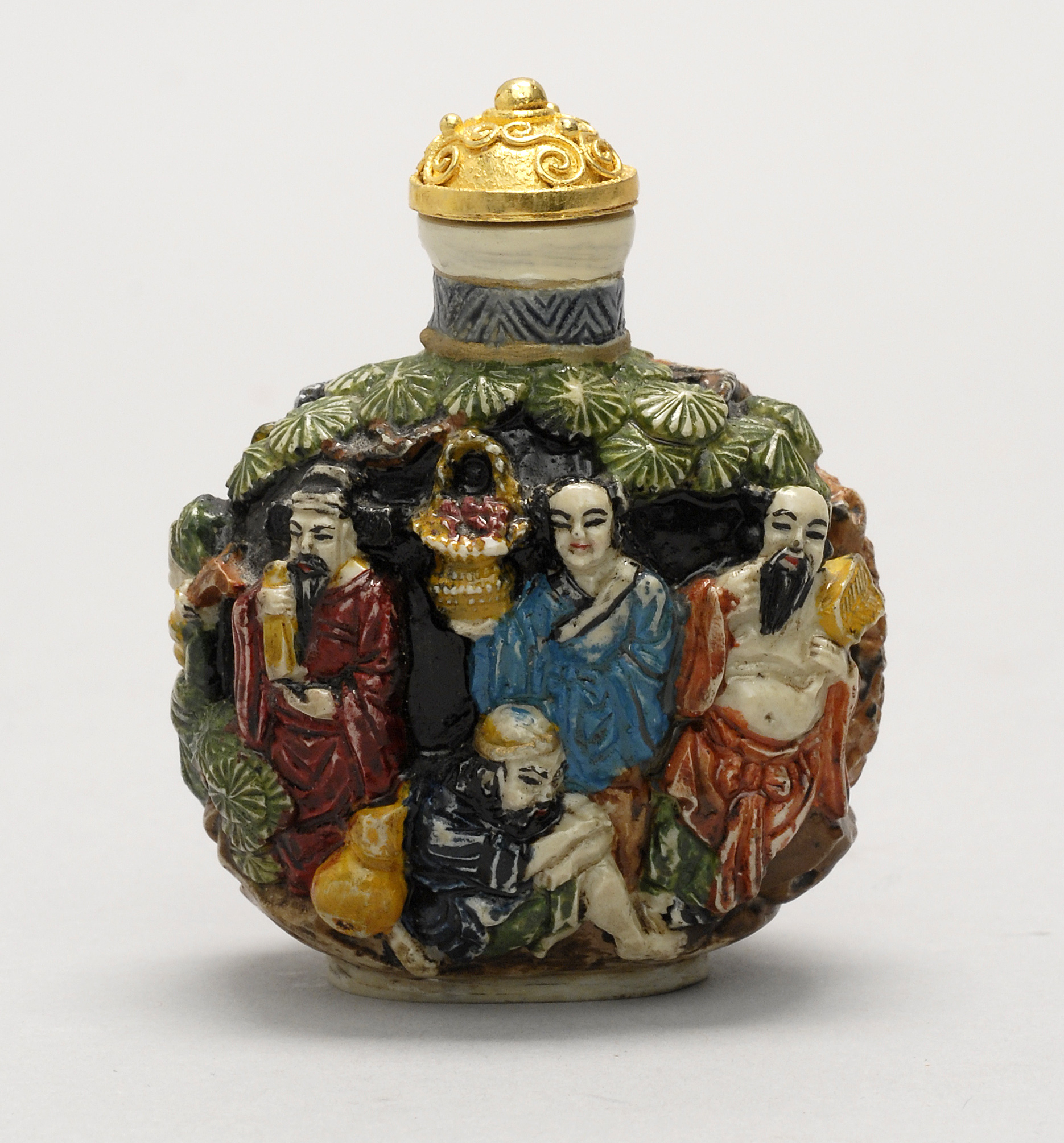 Appraisal: MOLDED POLYCHROME PORCELAIN SNUFF BOTTLE With Eight Lohan design Four-character