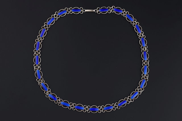 Appraisal: A BLUE ENAMEL COLLAR NECKLACE comprising a continuous line of