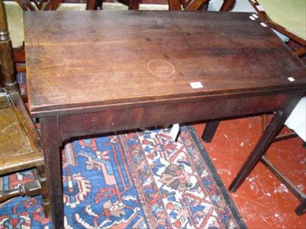 Appraisal: A George III mahogany folding card table