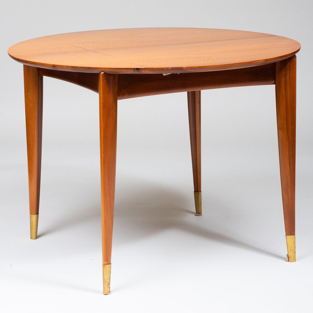 Appraisal: Gio Ponti Mahogany Extension Dining Table With three leaves and