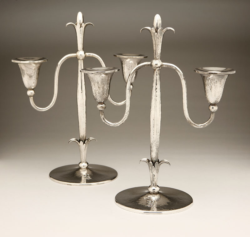 Appraisal: A pair of Clemens Friedell hammered sterling silver twin-light candelabra