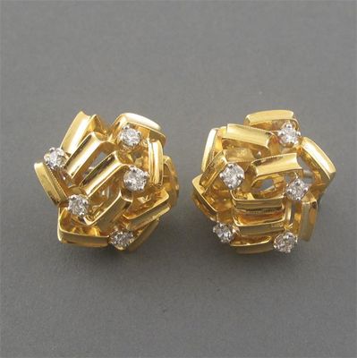 Appraisal: A pair of diamond set gold Cartier earrings each circular