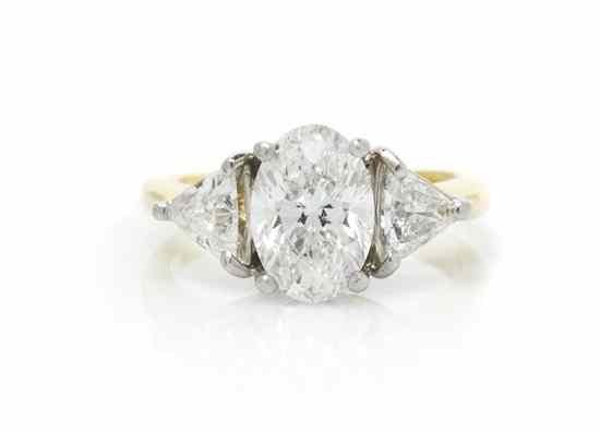 Appraisal: An Karat Yellow Gold Platinum and Diamond Ring containing one