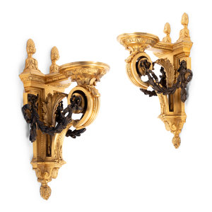 Appraisal: A Pair of Louis XVI Style Gilt and Patinated Bronze