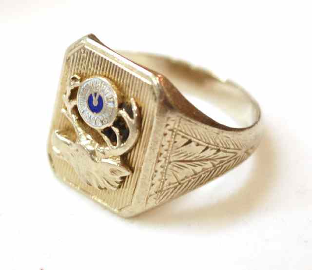 Appraisal: MAN'S FOURTEEN KARAT GOLD RING with blue and white enamel