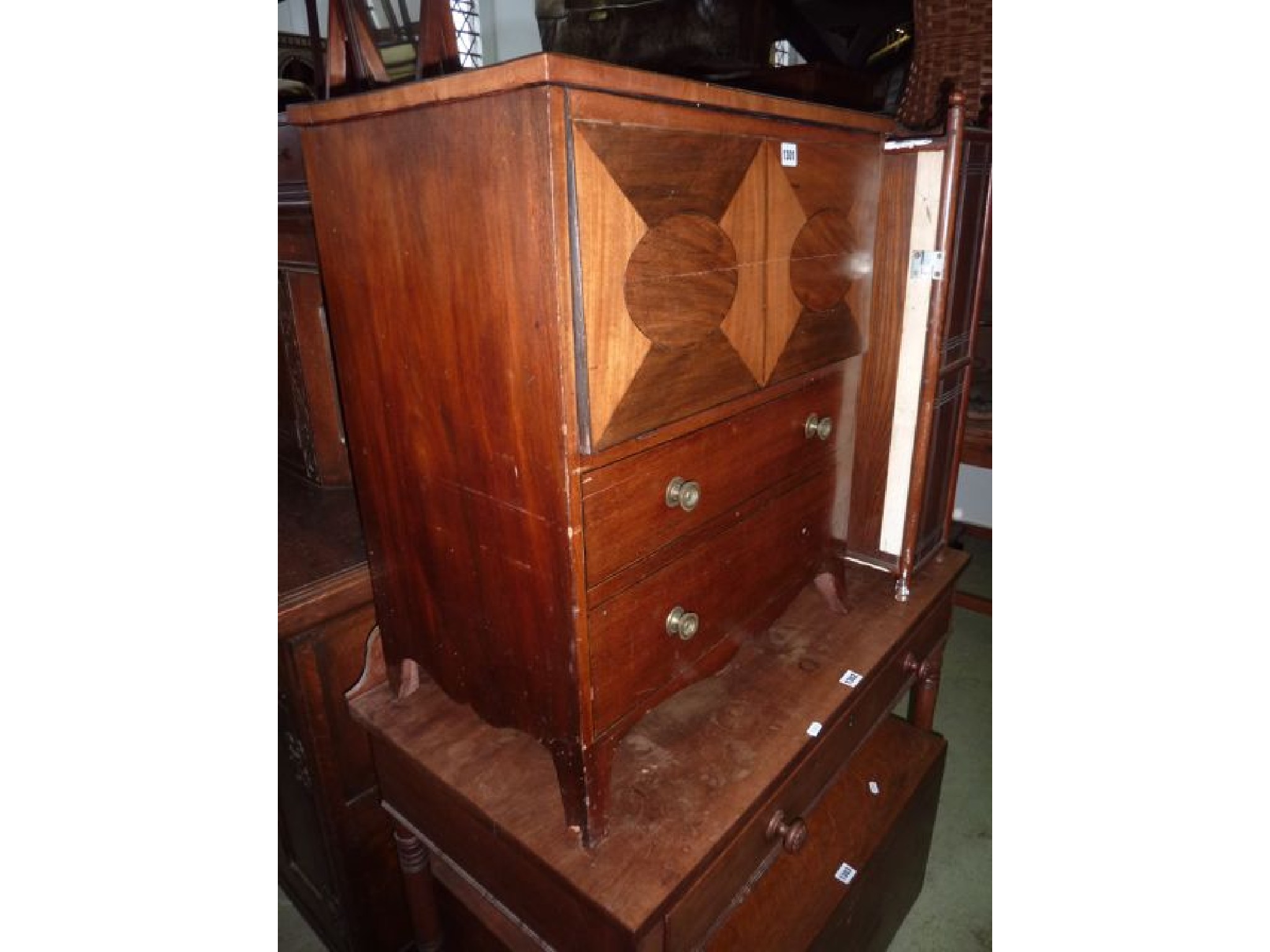 Appraisal: A Georgian mahogany commode the front enclosed by two dummy