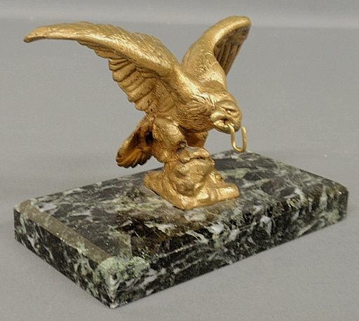 Appraisal: - Brass spread-winged eagle watch holder with a rectangular marble