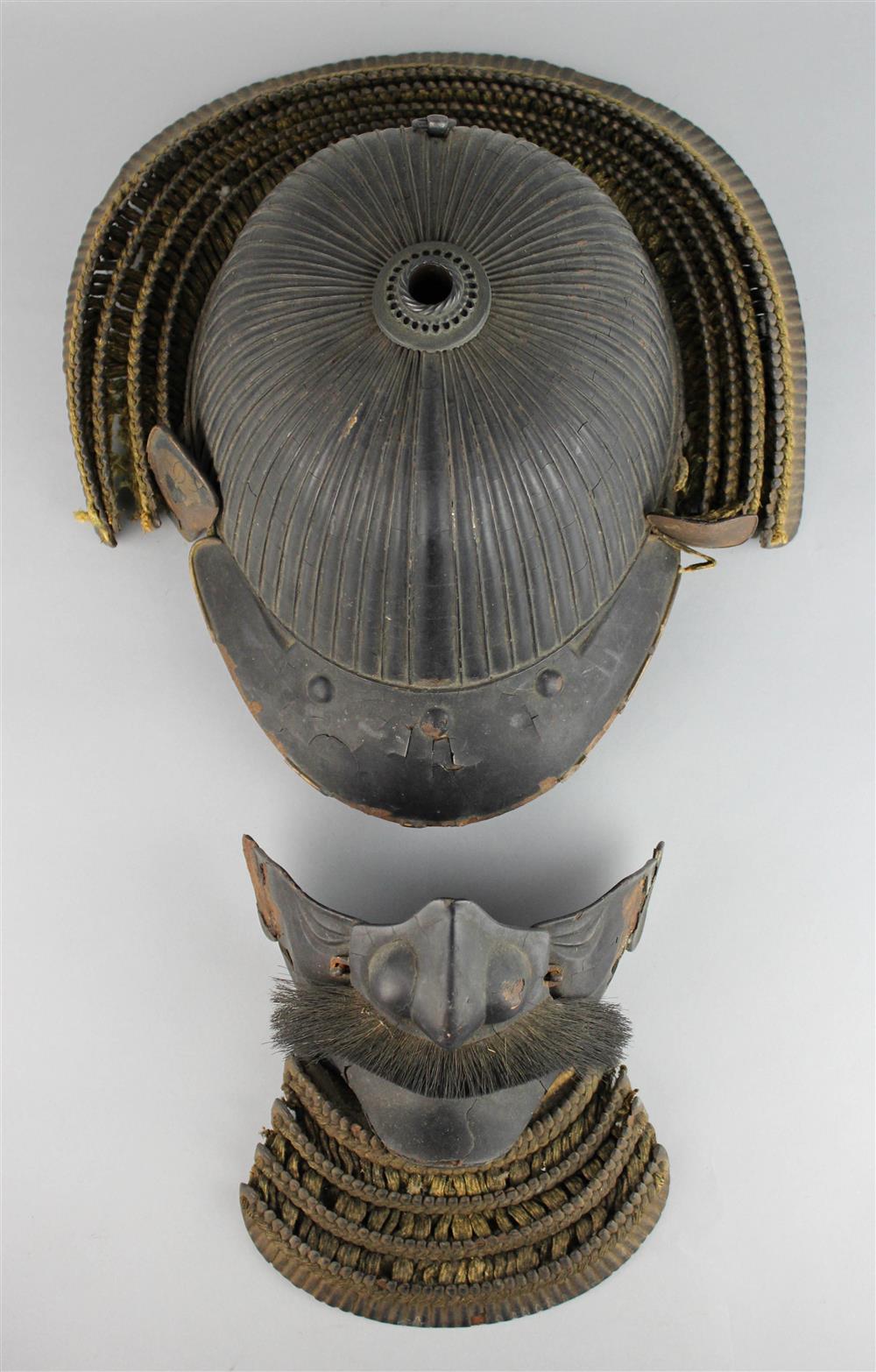 Appraisal: JAPANESE KABUTO HELMET AND MEMPO FACEGUARD EDO PERIOD the cast