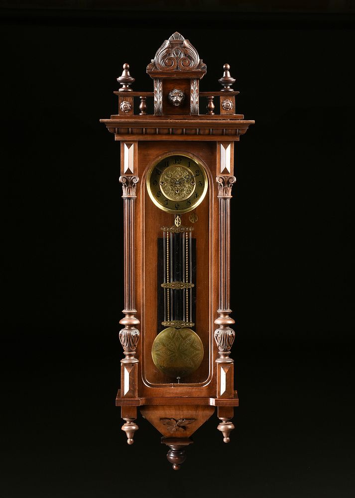 Appraisal: AN ANTIQUE BRASS AND CARVED WALNUT REGULATOR WALL CLOCK POSSIBLY