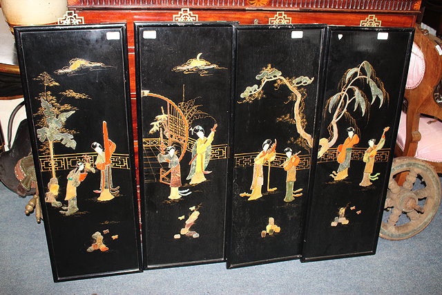 Appraisal: A SET OF FOUR BLACK LACQUERED ORIENTAL SCREENS each with