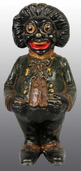 Appraisal: Cast Iron Golliwog Still Bank Description Manufactured by John Harper