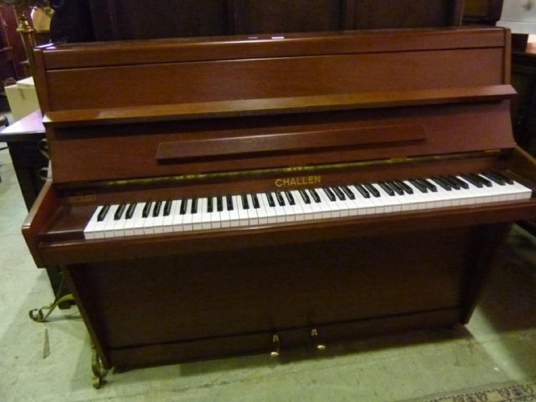 Appraisal: A Chalon modern upright iron framed and over strung piano