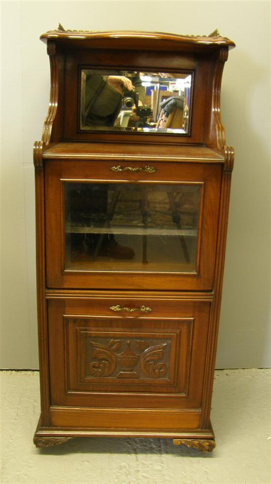 Appraisal: th century mahogany music cabinet with brass gallery mirrored back