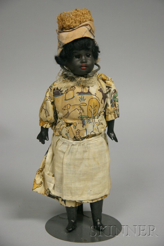 Appraisal: Black Painted Bisque Doll Germany with open mouth vibrant red