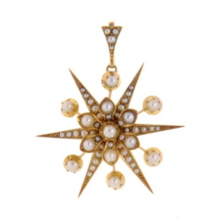 Appraisal: A CULTURED PEARL STAR PENDANT in gold c