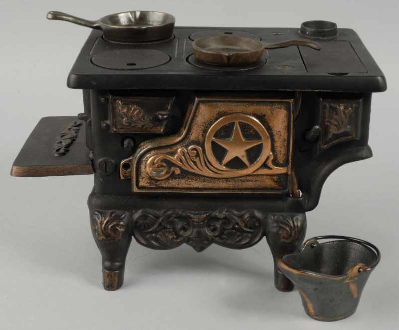 Appraisal: Cast Iron Kenton Star Children's Stove Description Includes accessories Condition