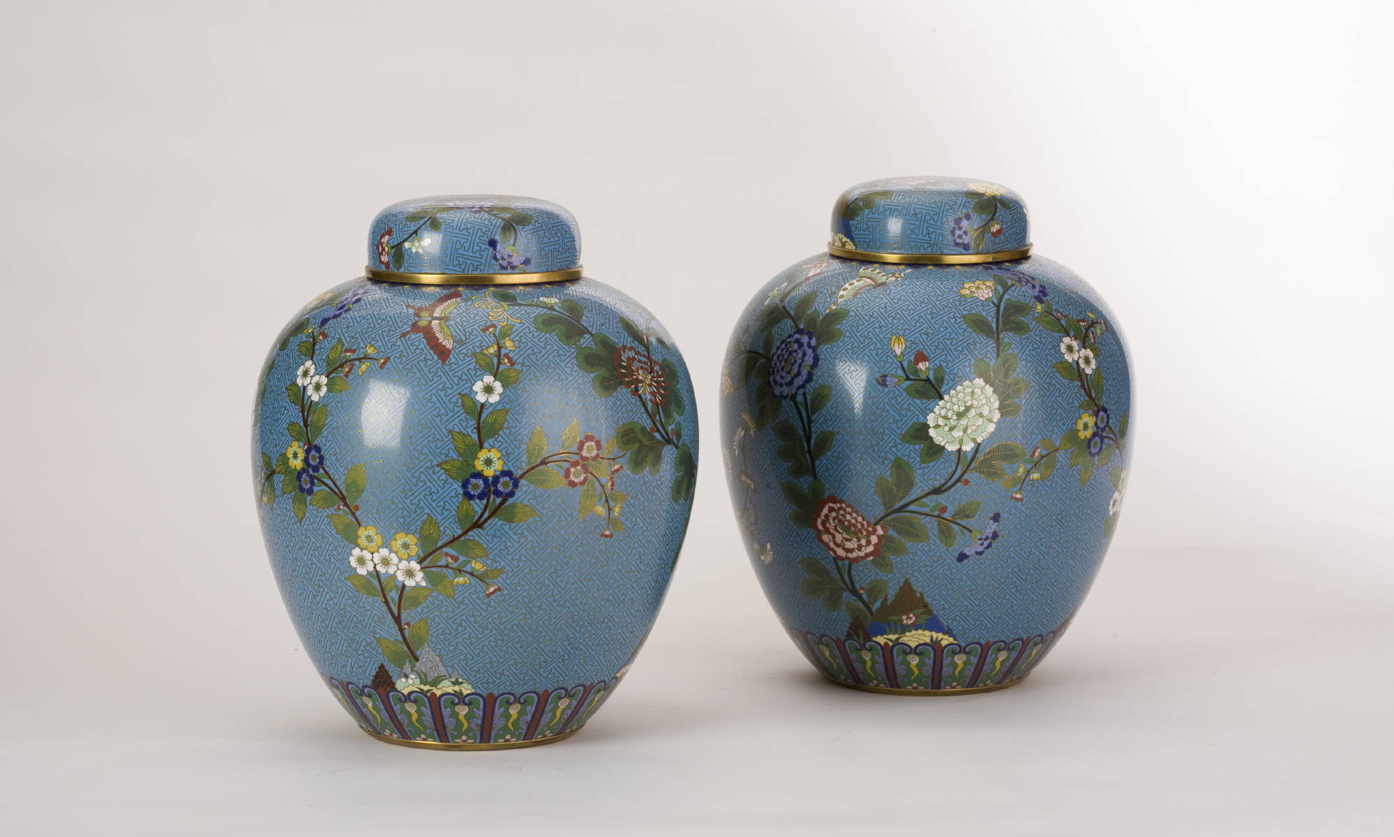 Appraisal: PAIR OF CHINESE CLOISONNE GINGER JARS WITH BLUE GROUND AND