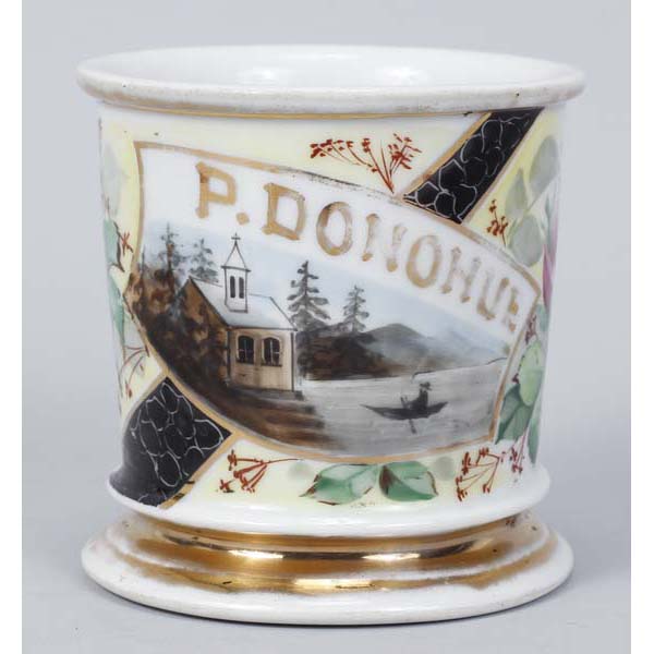 Appraisal: Scenic framed shaving mug with chapel and priest rowing a