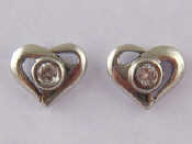 Appraisal: A pair of platinum and diamond ear studs designed as