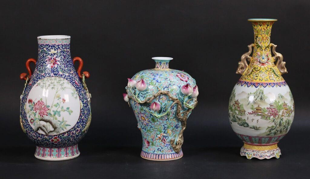 Appraisal: THREE CHINESE FAMILLE STYLE PORCELAIN VASESThree Chinese famille style porcelain