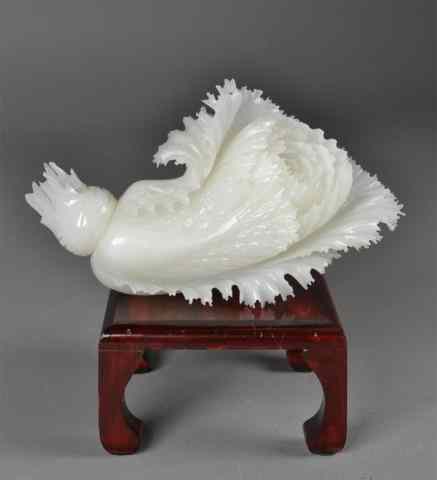 Appraisal: Large Chinese Carved White Jade CabbageFinely carved to depict a