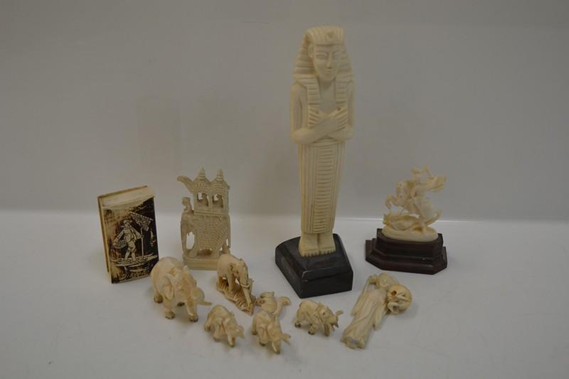 Appraisal: A BAG OF IVORY AND BONE CARVINGS