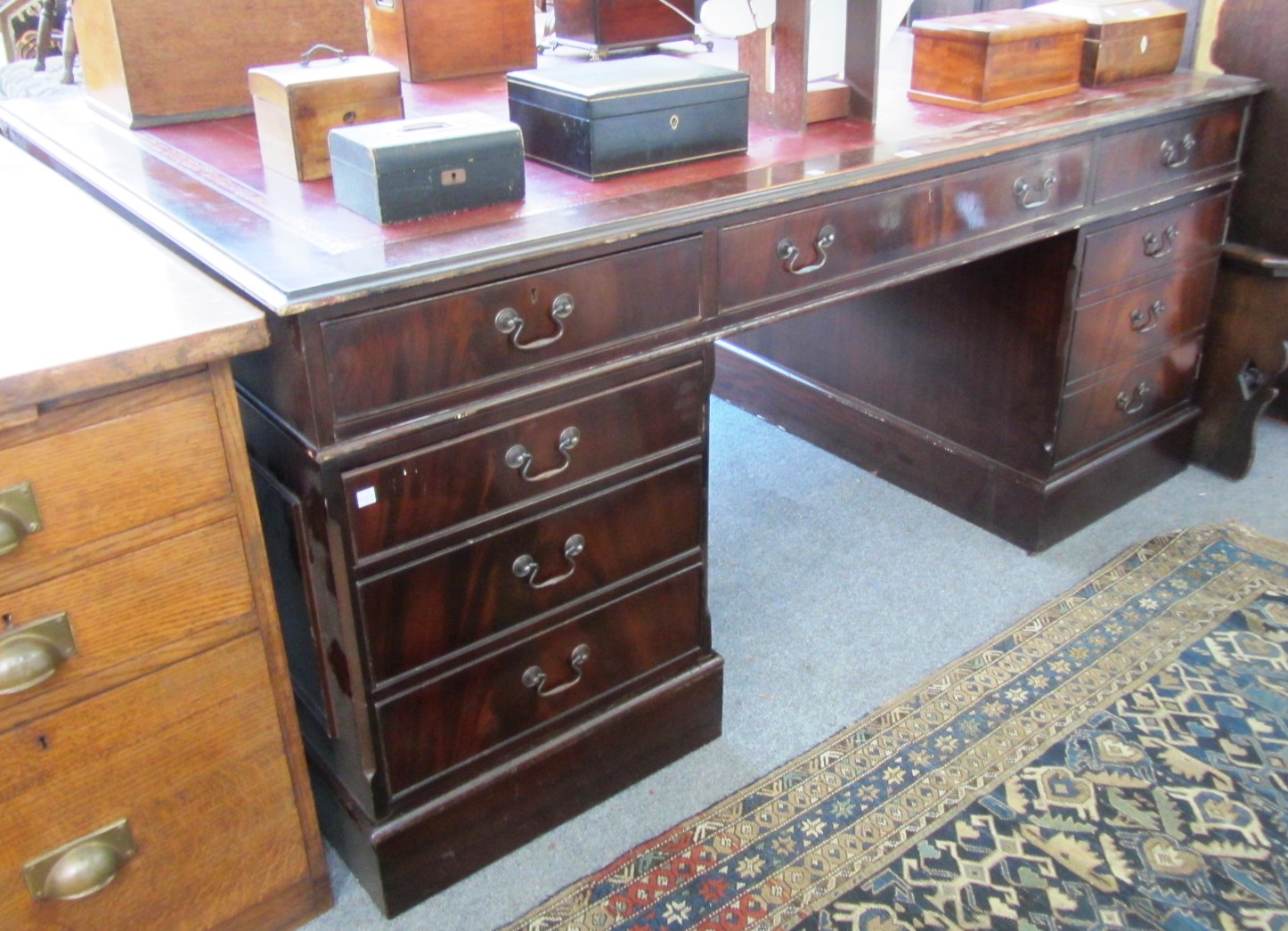 Appraisal: An th century style mahogany partners desk with six drawers