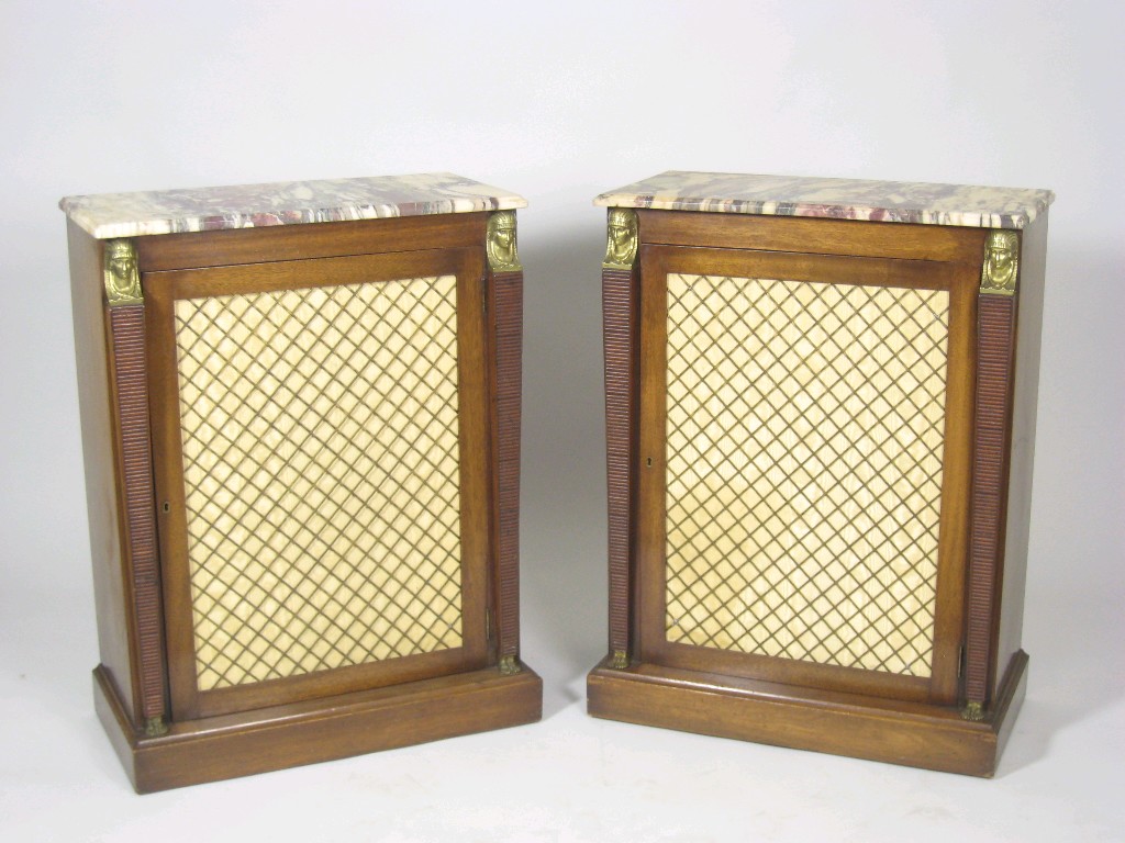 Appraisal: A pair of marble topped Pier Cabinets having single grilled