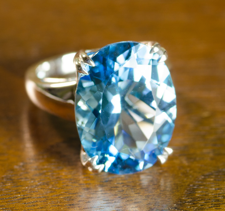 Appraisal: BLUE TOPAZ AND FOURTEEN KARAT WHITE GOLD RING set with