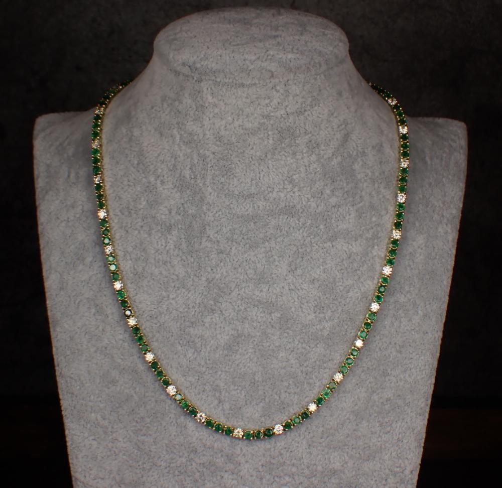 Appraisal: EMERALD DIAMOND AND FOURTEEN KARAT GOLD LINE NECKLACE all round-cut