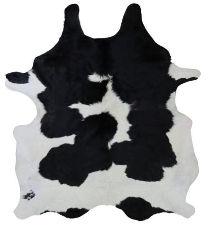 Appraisal: Cowhide black and white approx l w