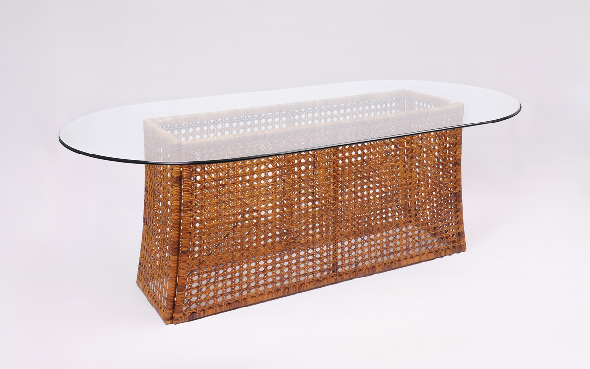 Appraisal: DANNY HO FONG RATTAN CONSOLE TABLE Rattan and metal construction