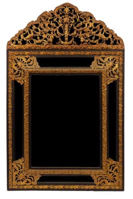 Appraisal: A Venetian wall mirror the arch-top applied embossed decoration of