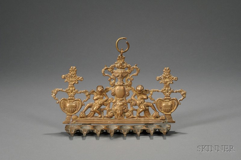 Appraisal: Italian Gilt-bronze Hanukkah Lamp th century pierced backplate centered by