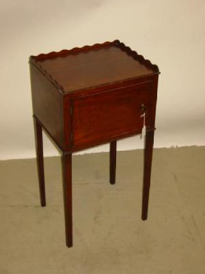 Appraisal: A GEORGE III MAHOGANY BEDSIDE CUPBOARD of oblong form the