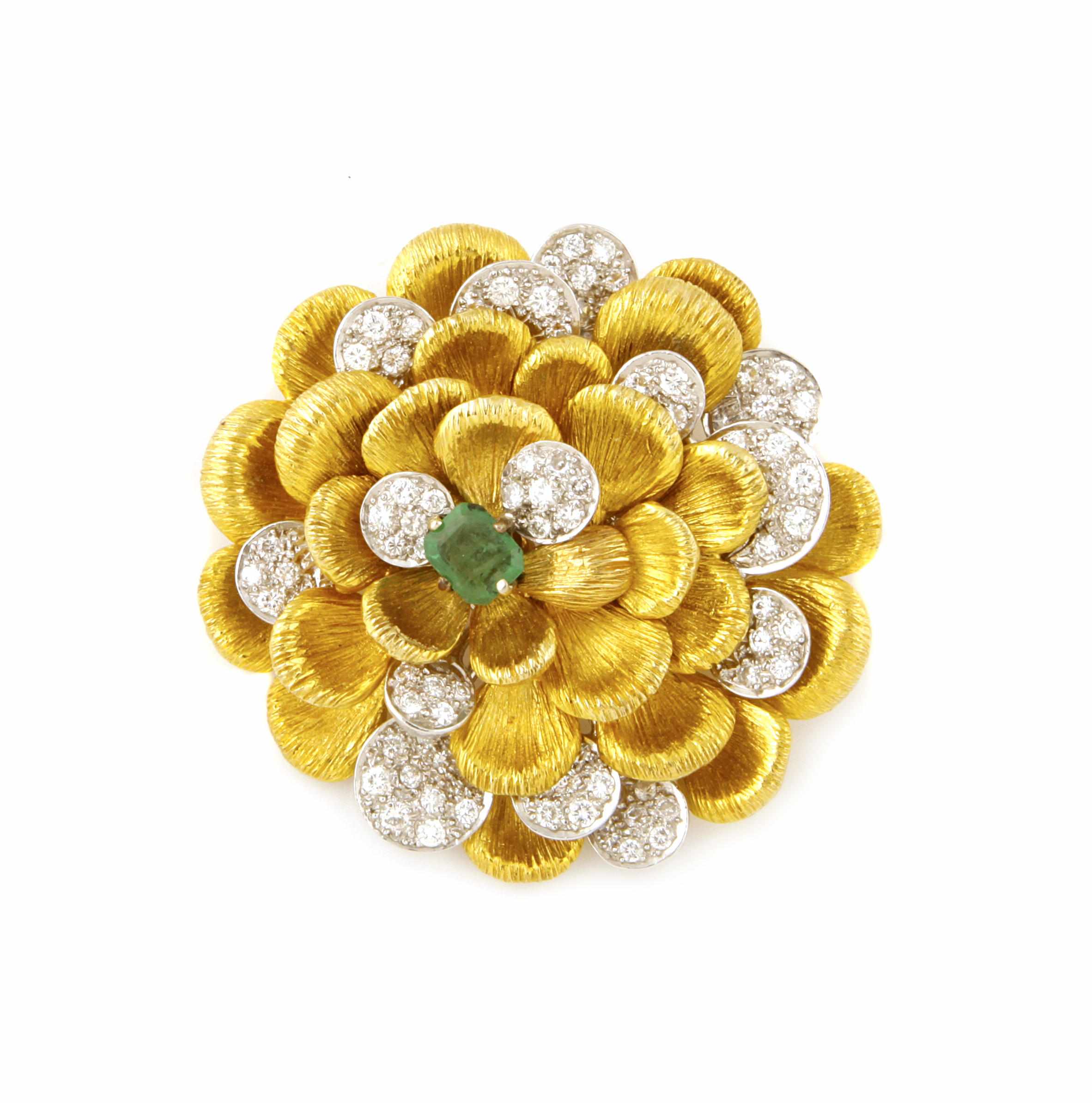 Appraisal: An emerald diamond and k bicolor gold floral brooch estimated