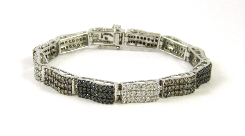 Appraisal: DIAMOND AND FOURTEEN KARAT WHITE GOLD BRACELET measuring - inches