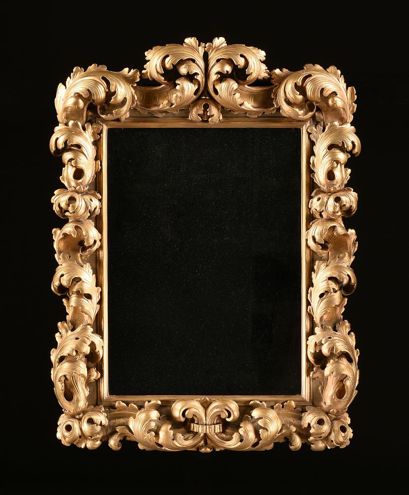 Appraisal: A GERMAN BAROQUE STYLE PARCEL GILT CARVED WOOD MIRROR TH