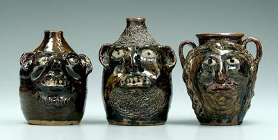 Appraisal: Three Marie Rogers face vessels one two-handled vase brown glaze