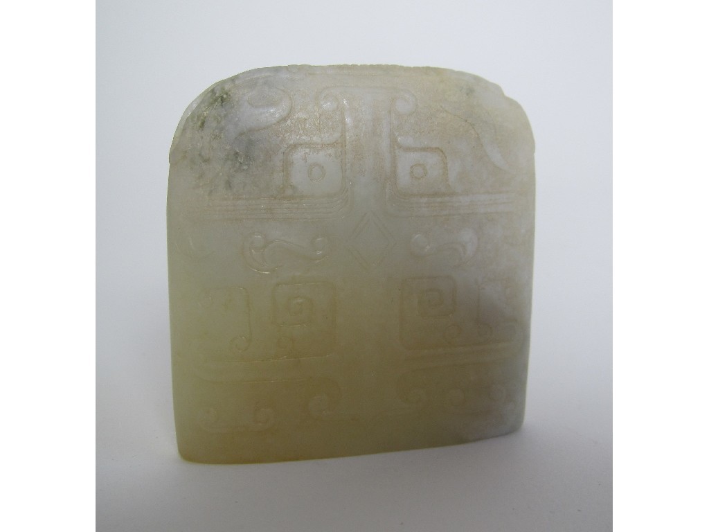 Appraisal: A Chinese archaic jade pommel carved with tao tie masks