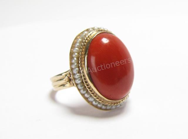 Appraisal: K yellow gold antique oval shaped cabochon red coral and