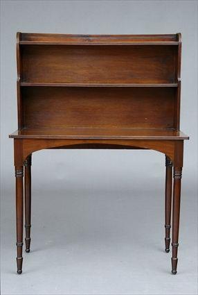 Appraisal: REGENCY MAHOGANY SIDE TABLE The back with shelves supported by